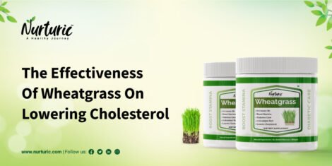 What are the benefits of wheatgrass in lowering cholesterol